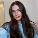 @caitliniola