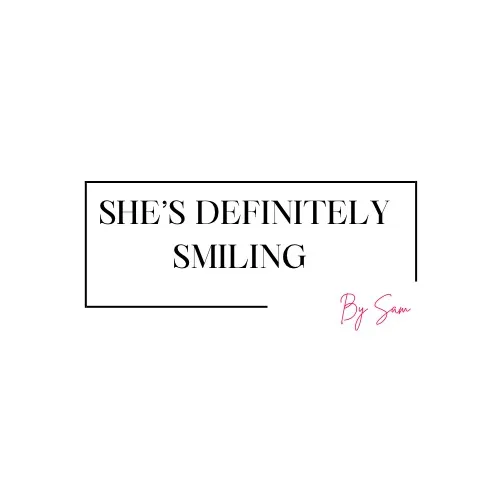 shes.def.smiling
